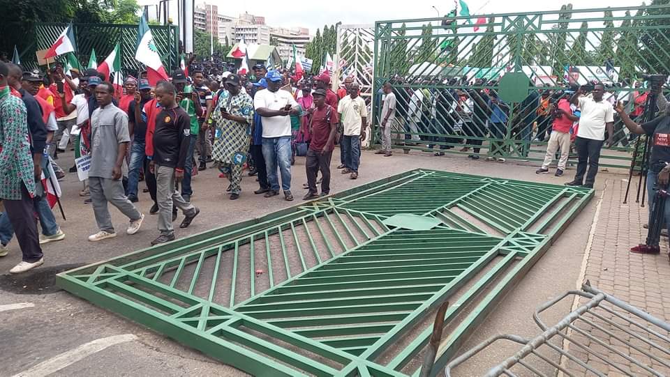 Entrance gate of National Assembly pulled down by Protesting workers,yesterday.