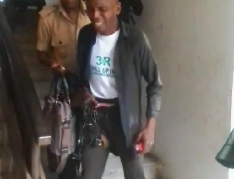 Unegbu Chimaobi Michael being arrested by the police,a day after he was attacked by Rosiline Izuogu's son.