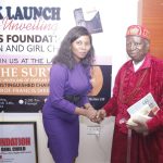HRH Eze John Nwosu(Right) and Author of "The survivor",Dorcas Sampson Achi during book launch/unveiling of Foundation,in Owerri,recently.