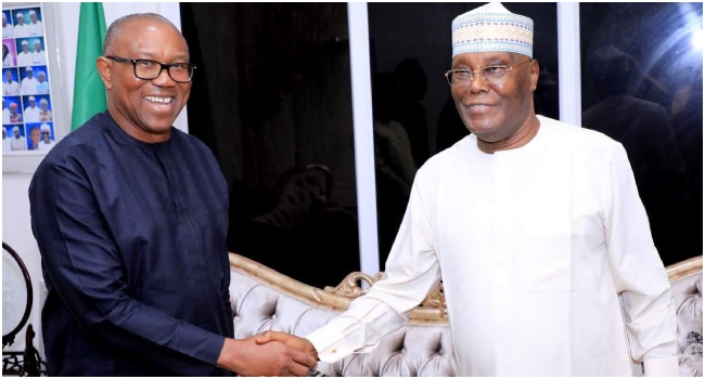 Peter Obi(Left),in a warm handshake with Atiku Abubakar,when the former visited the latter,yesterday.
